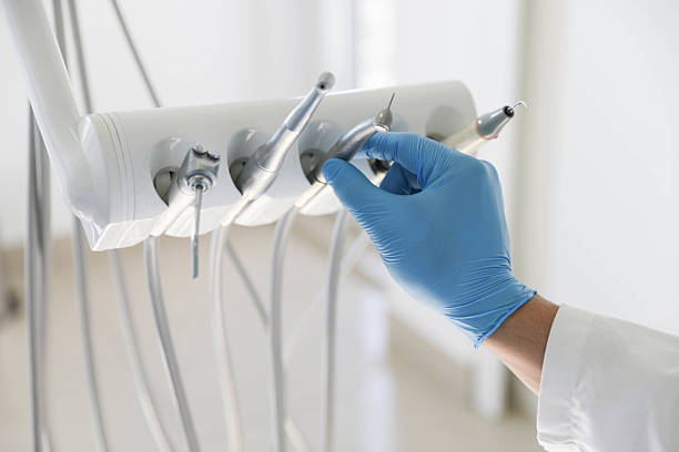 Professional Tooth Extraction technician working in Trenton, TN